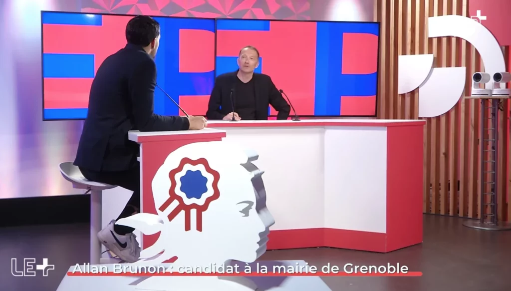 Allan Brunon, candidat La France Insoumise à la mairie de Grenoble sur le plateau de TG+ avec le journaliste Thibault Leduc